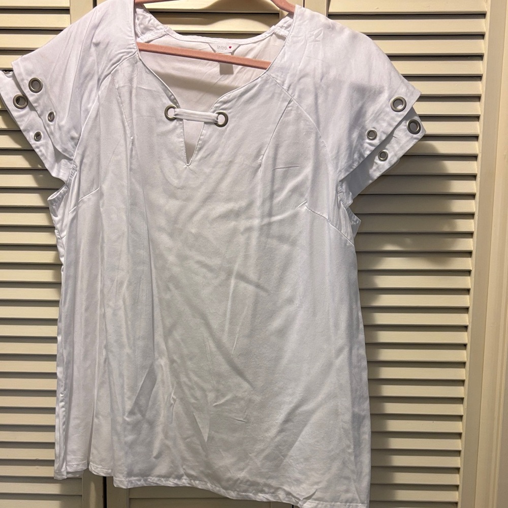 Intro. White Blouse with Eyelet Accents